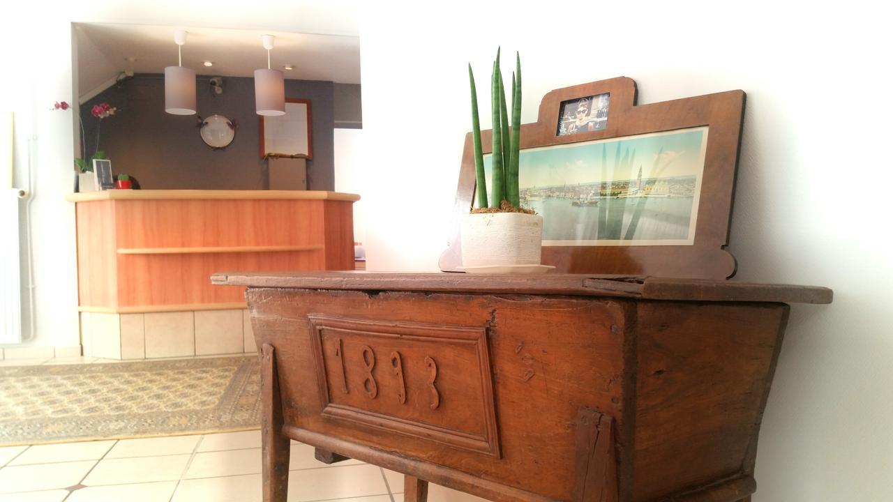 Logis Hotel Du Commerce Вольвик Экстерьер фото