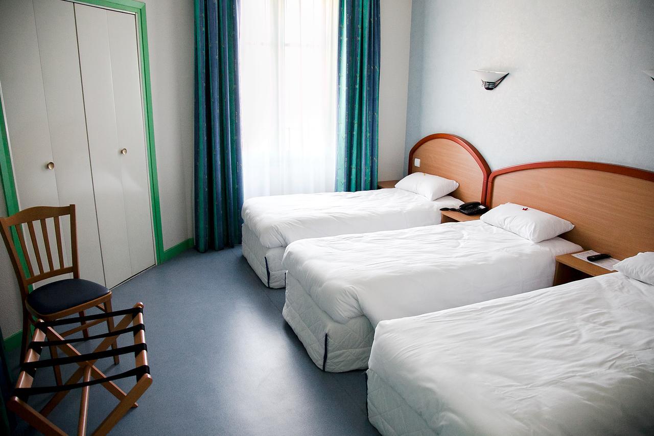 Logis Hotel Du Commerce Вольвик Экстерьер фото